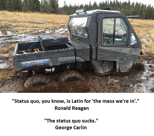 picture of a utility vehicle stuck in the mud