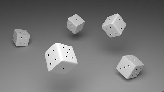 a picture of tumbling dice to symbolize luck